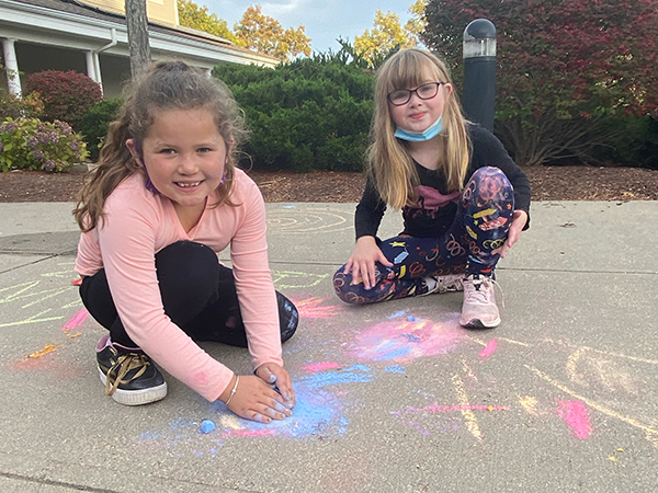 girls sidewalk chalk